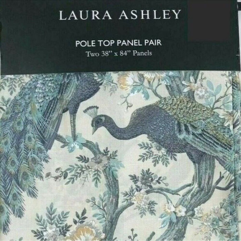 A pair 38x84 Laura Ashley Curtain panels, not in original pkg, but never used.